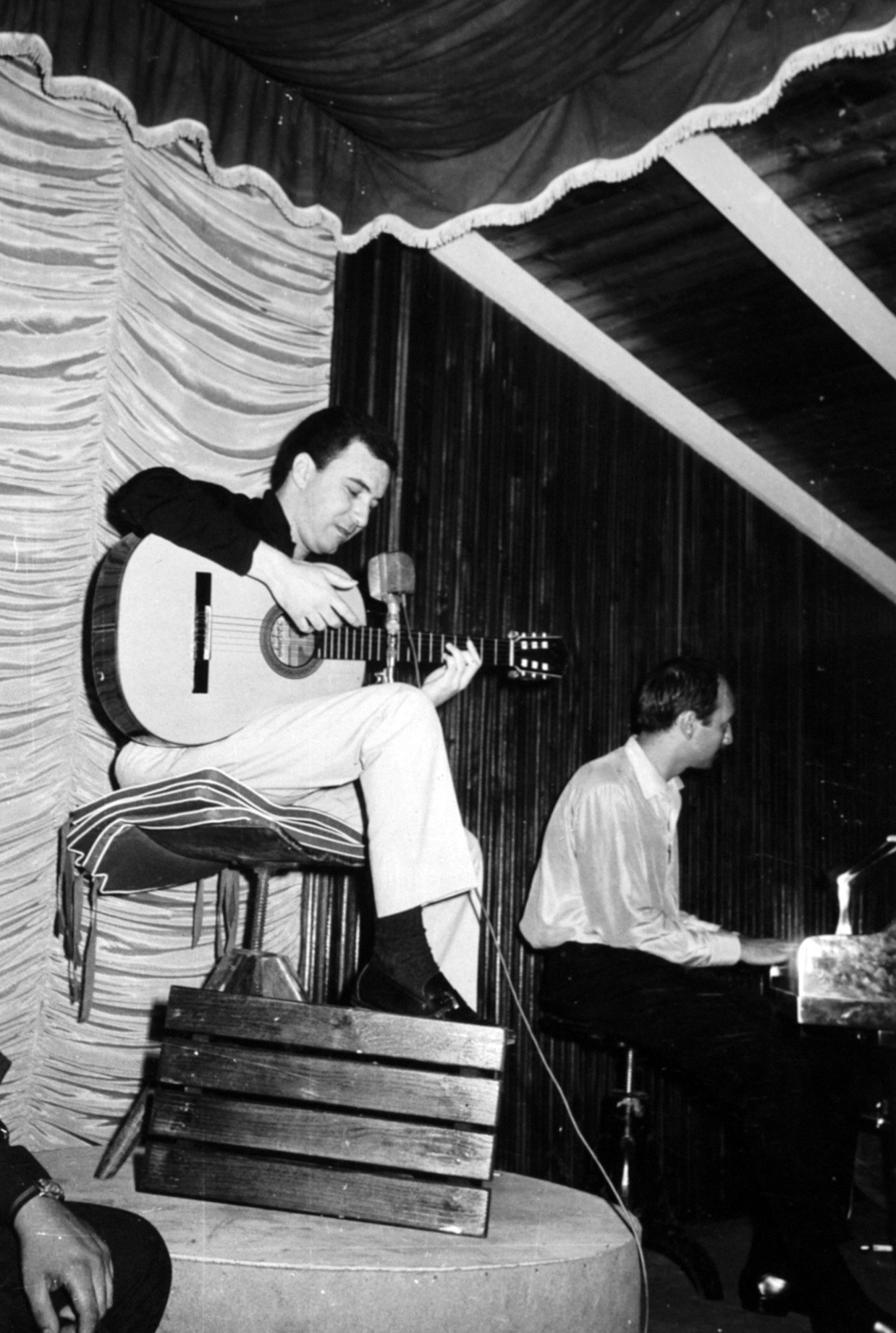 Donato sitting at piano with Antonio Calros Jobim.